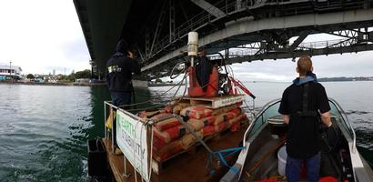 Use Of Floating Work Platform And Boat To Access Coastal Property